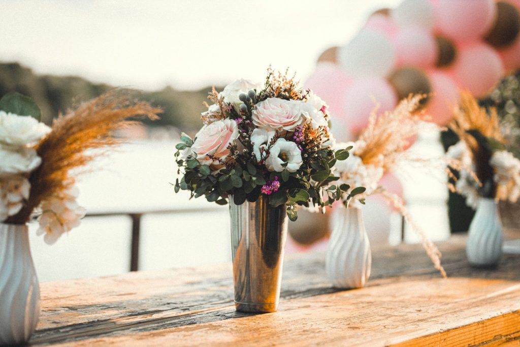 a vase of flowers on a table